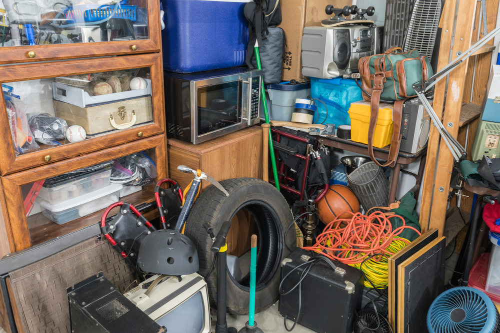 Storage,clutter,and,household,junk,filling,garage,corner.